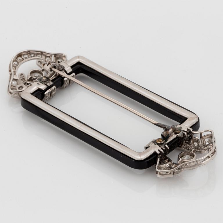 Janesich Art Deco brosch med onyx och gammal- och åttakantslipade diamanter.