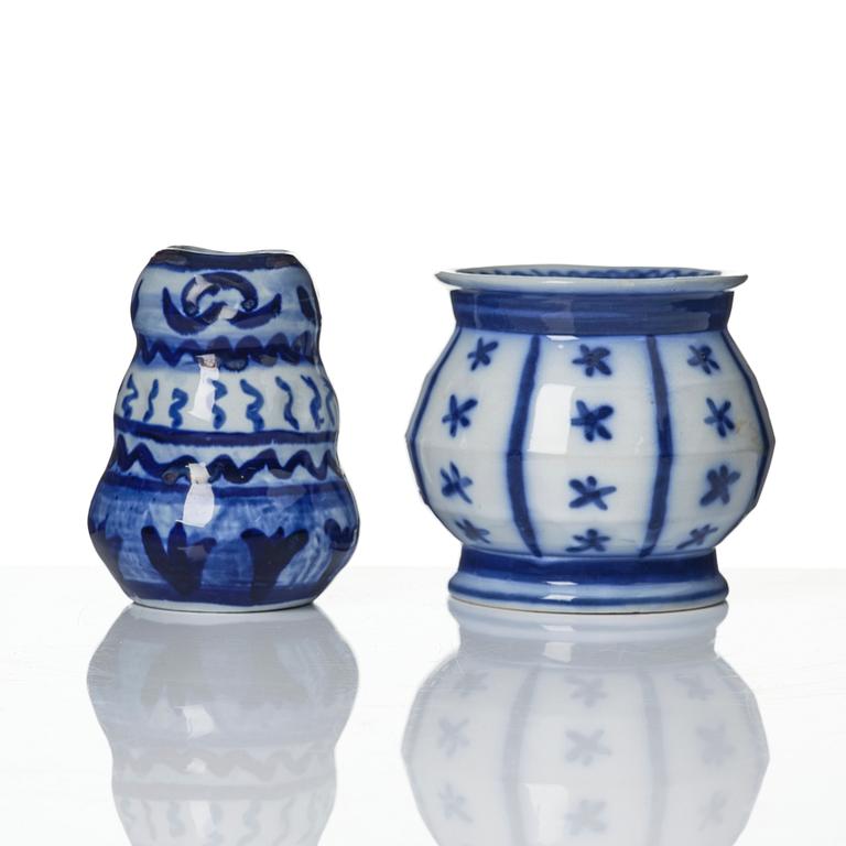 Wilhelm Kåge, a jar with cover, and four vases, creamware and porcelain, Gustavsberg, Sweden, 1917-1920.