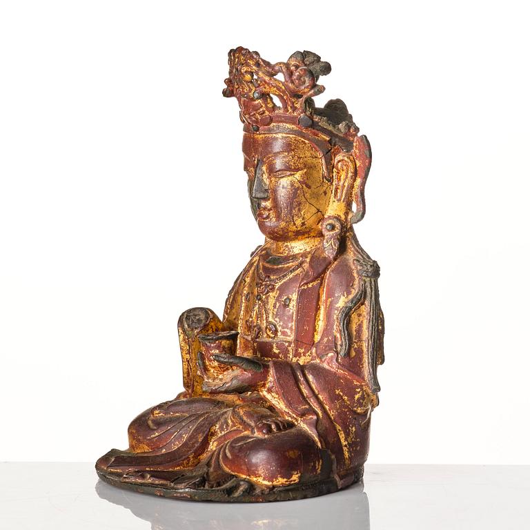 A seated bronze scultprue of a Bodhisattva, Ming dynasty (1368-1644).