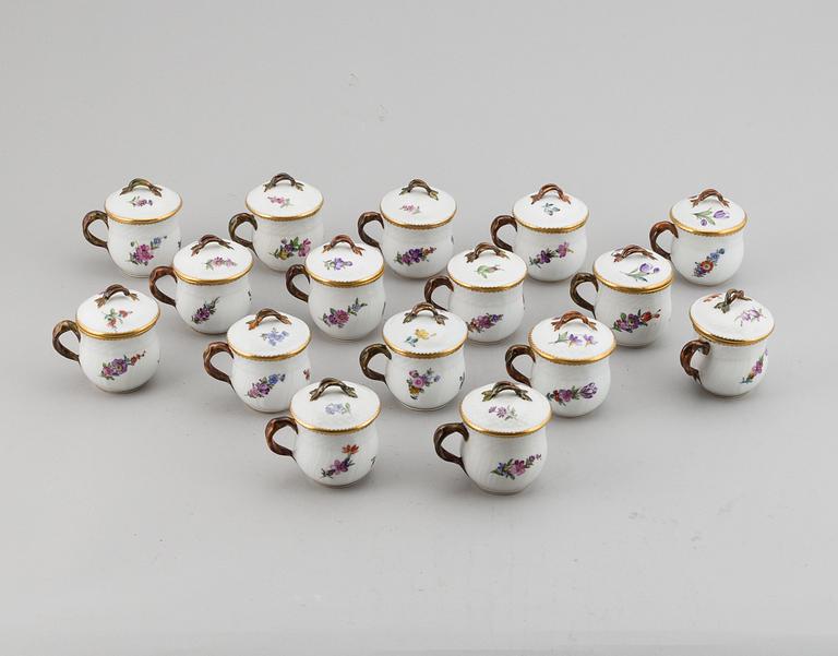 A set of 16 Royal Copenhagen custard cups with covers, Denmark, 20th Century.