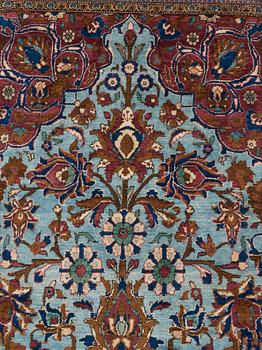 A RUG, a semi-antique silk Kashan, ca 201,5 x 122-130 cm.