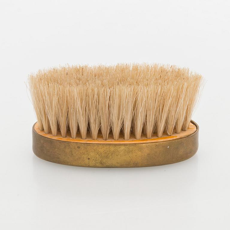 Maija Heikinheimo, A 1960s hand clothes brush for Valaistustyö for Artek, Finland.