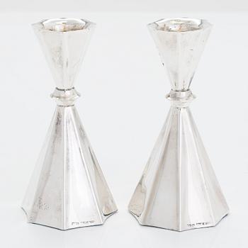 A 2-arm silver candle holder and a pair of silver candlesticks, Anna-Greta Eker and Hopearae Lasander, Turku 1965, 1963.