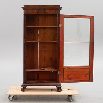 A Swedish late Empire mahogany book cabinet, ca 1830's.