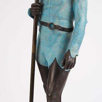 A bronze sculpture of a man in armour, late 19th century.