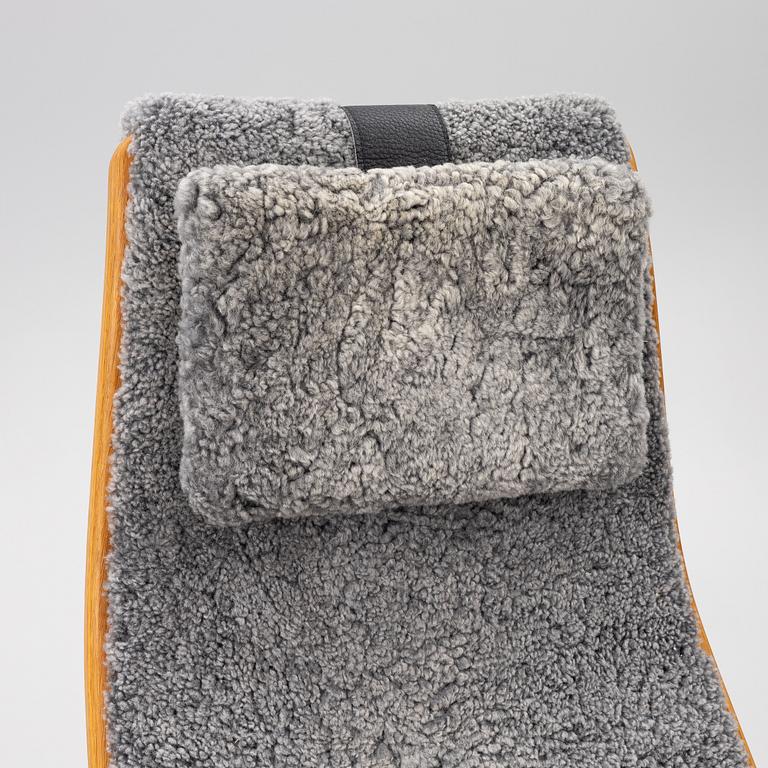 Yngve Ekström, a 'Lamino' armchair with ottoman, Swedese, Sweden, 2018.