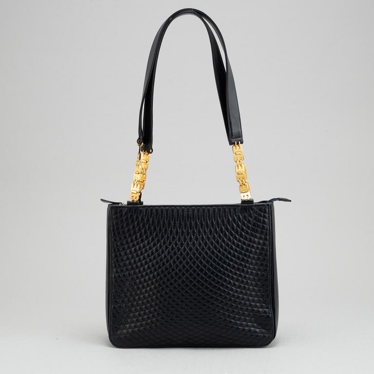 Bally, a navy leather handbag.