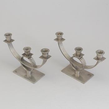 A pair of pewter candelabra, 1920's/30's.