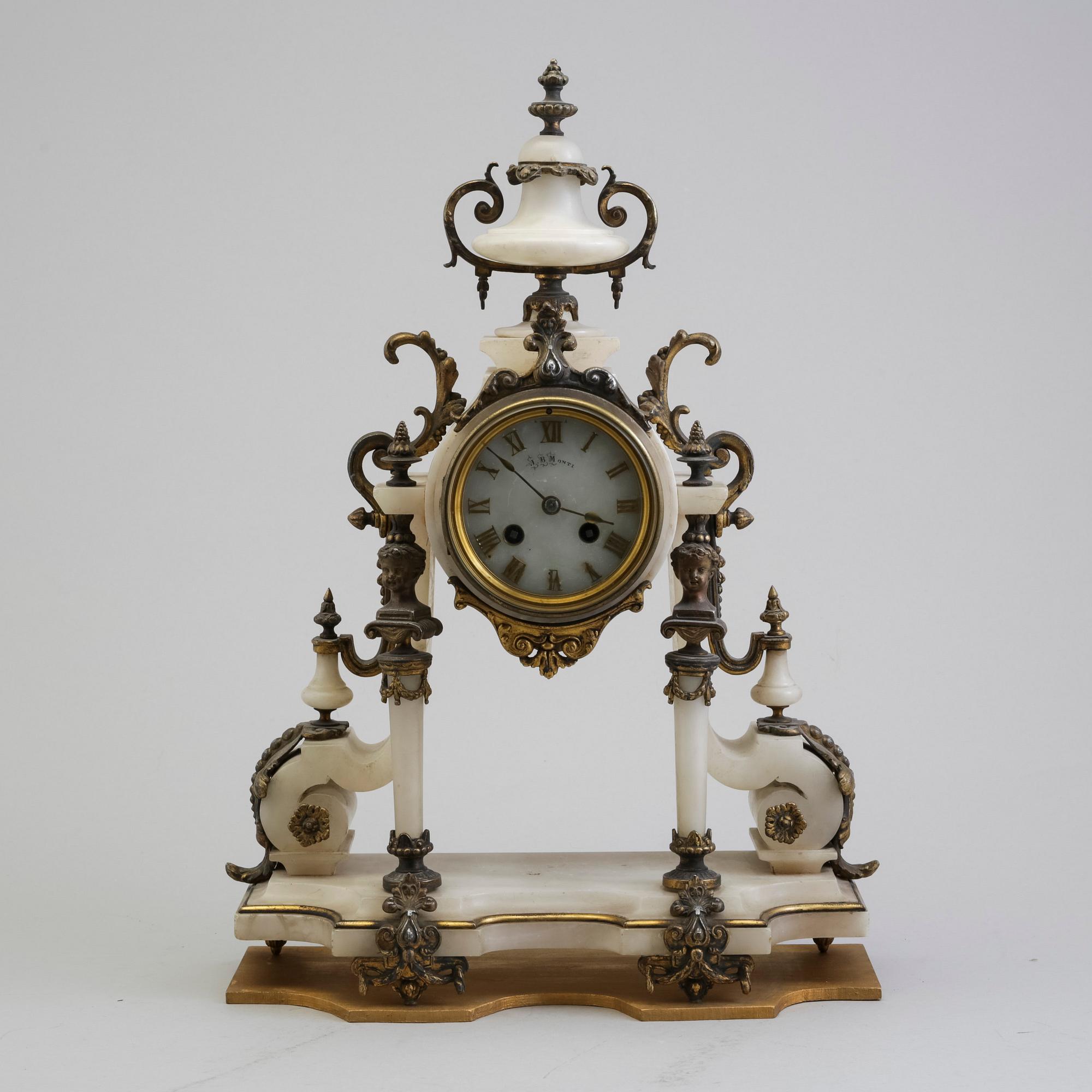An end of the 19th century alabaster table clock.