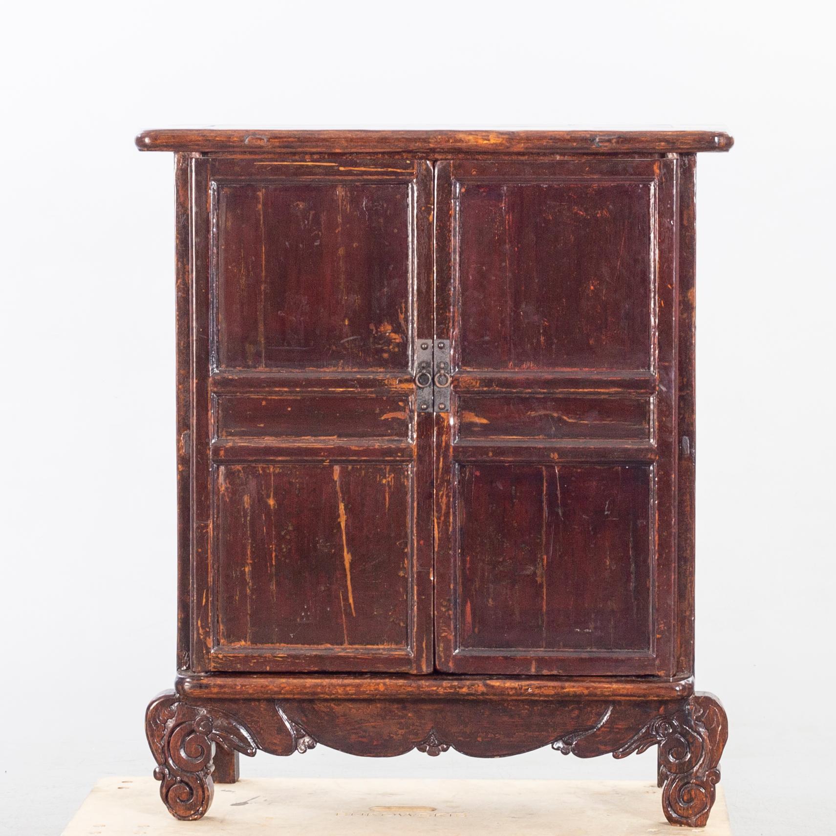 A 19TH CENTURY CHINESE CUPBOARD.