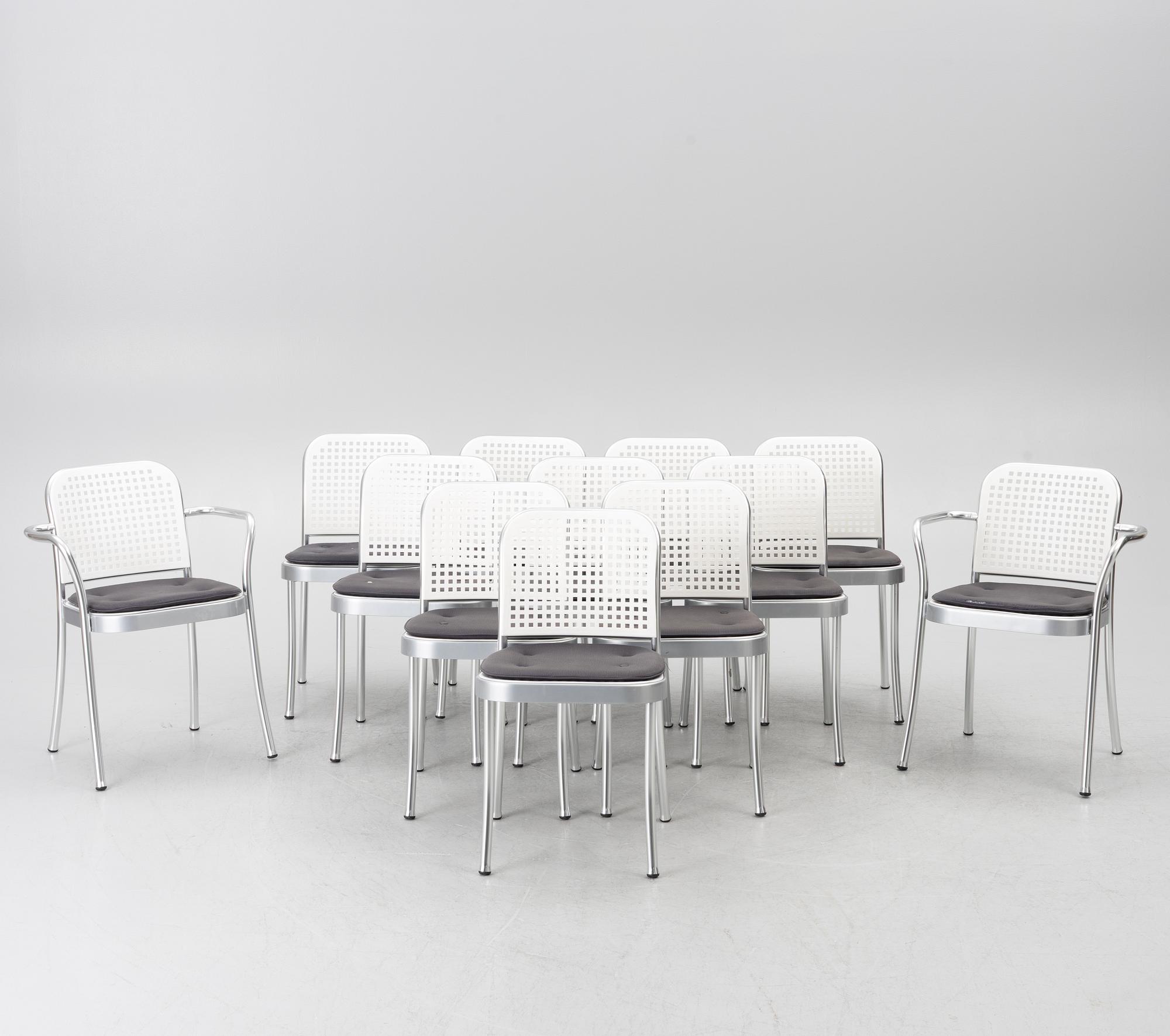 Vico Magistretti, a "Shine" dining table with twelve chairs, De Padova, Italy, around the year 2000.