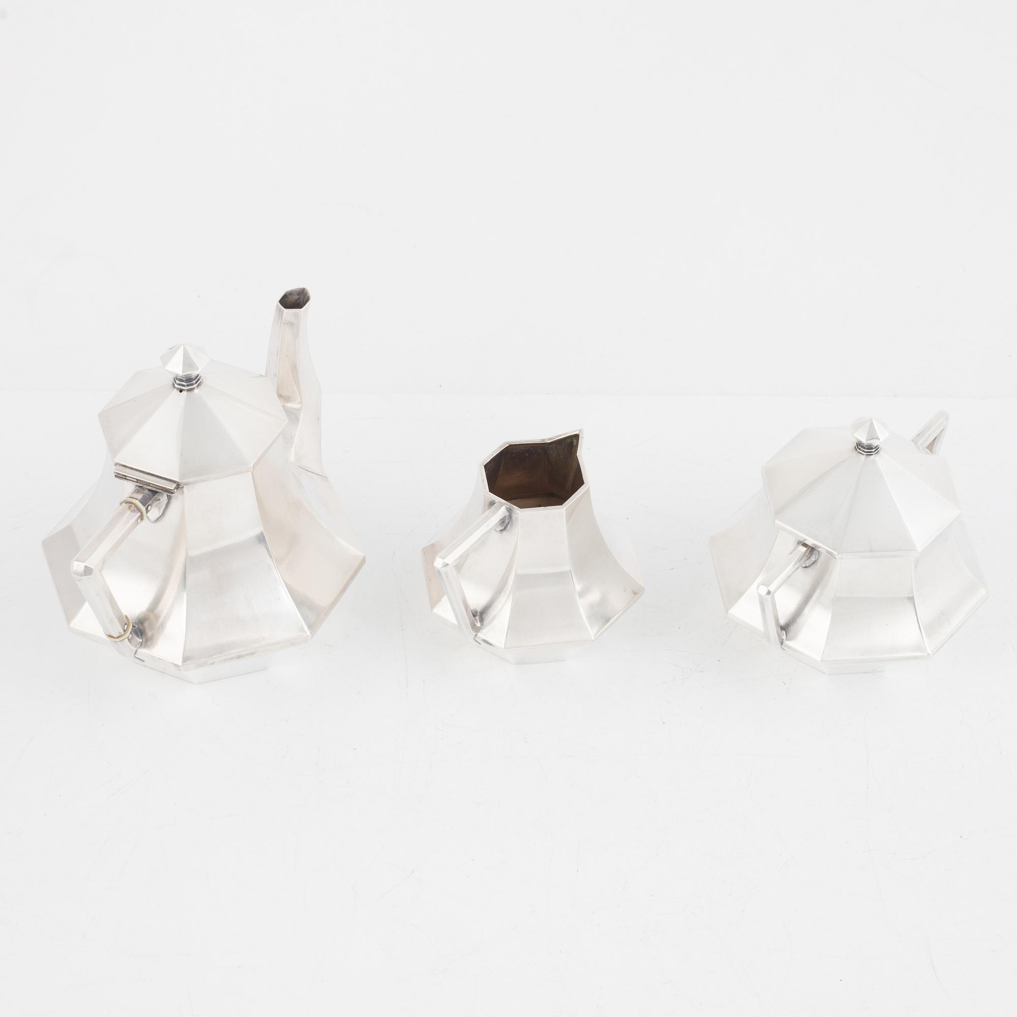 A Swedish Silver Mocha Pot, Creamer, and Sugar Bowl, mark of W.A. Bolin, Stockholm 1917.