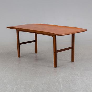 a late 20th century teak table.