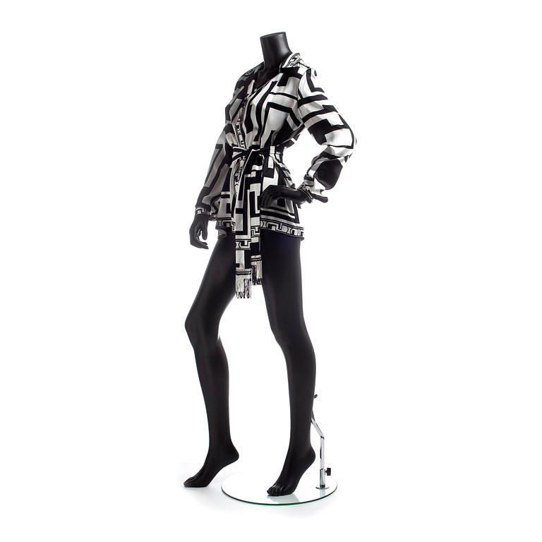 EMILIO PUCCI, a silk shirt with belt.