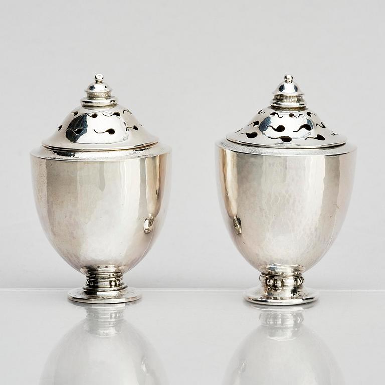 Georg Jensen, a pair of silver casters, design Johan Rohde, Copenhagen 1915-1921.