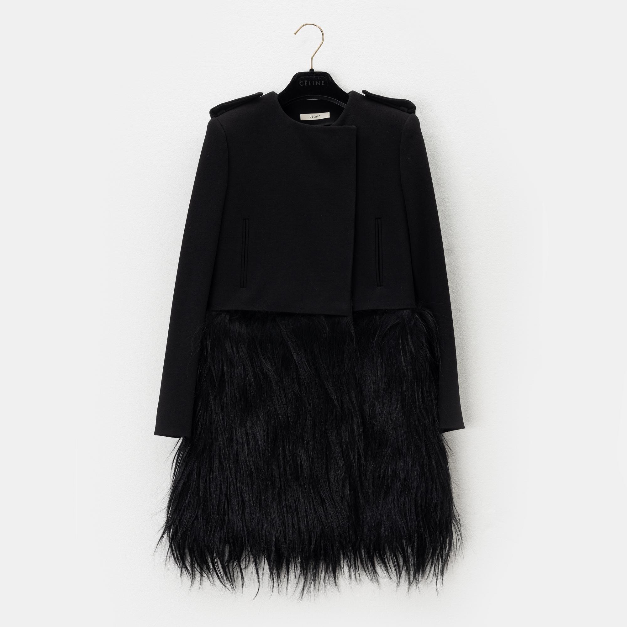 Céline, a black wool and fur coat, size 34.