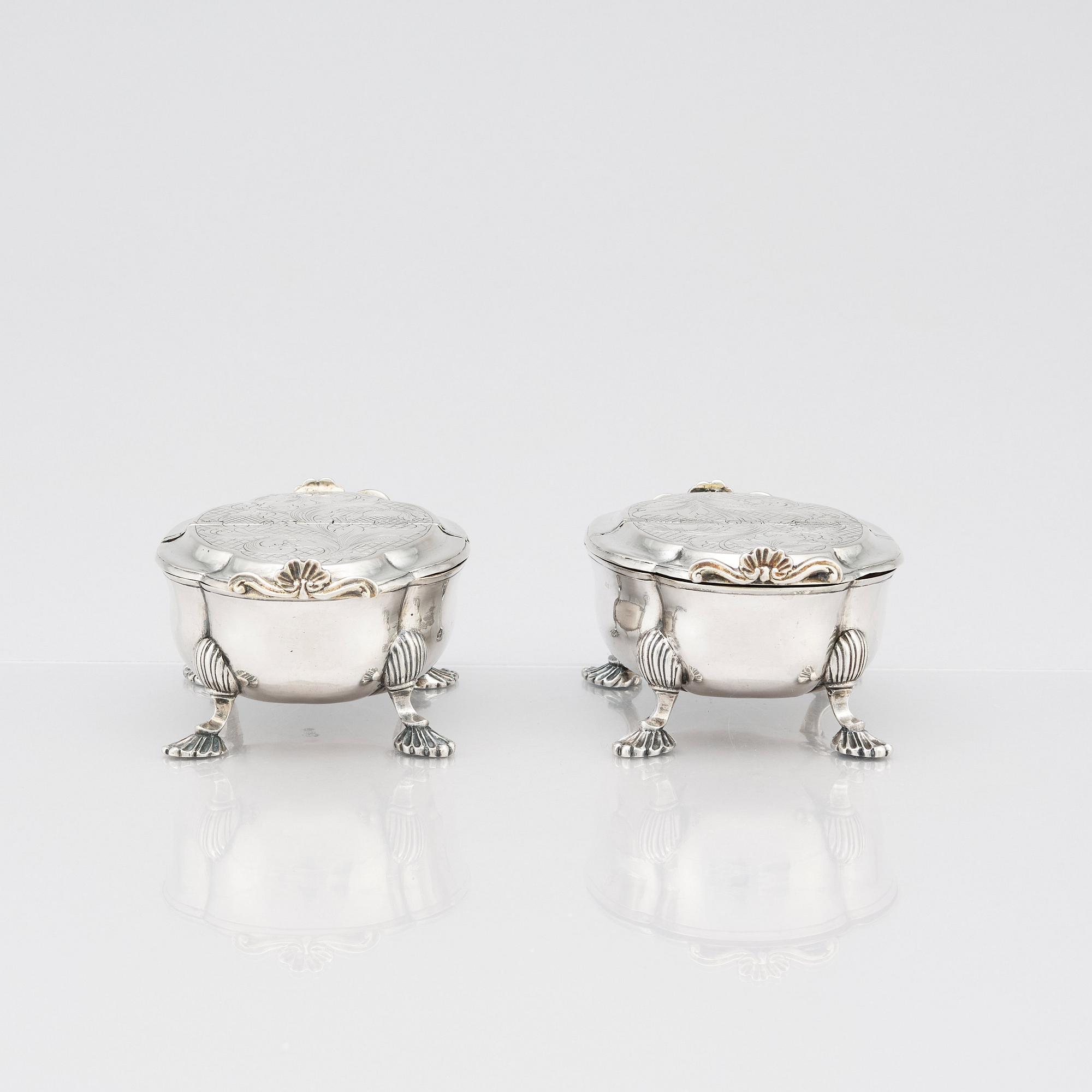 A pair of Latvian Rococo silver salt and pepper stands, marks of Johan Christian Henck (Henke), Riga 1768-80.