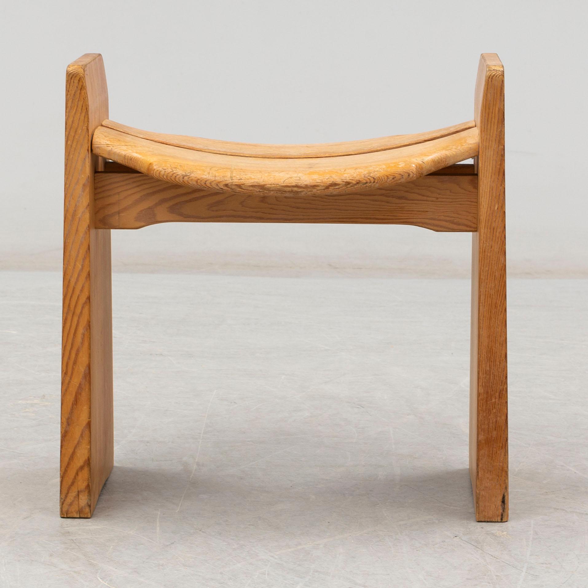 A 'Jonte' pine stool by Gilbert Marklund, designed 1969.