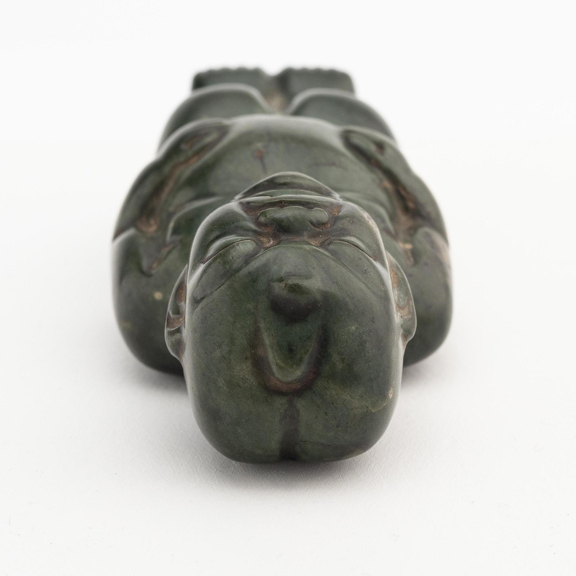 Figurin, grön sten, troligen Olmekisk 2500 f.Kr-250 e.Kr.