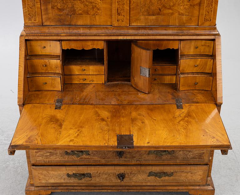 A Swedish rococo burr-alder veneered cabinet, later part 18th century.