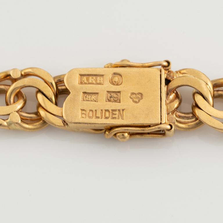 Gold Omega ladies watch.