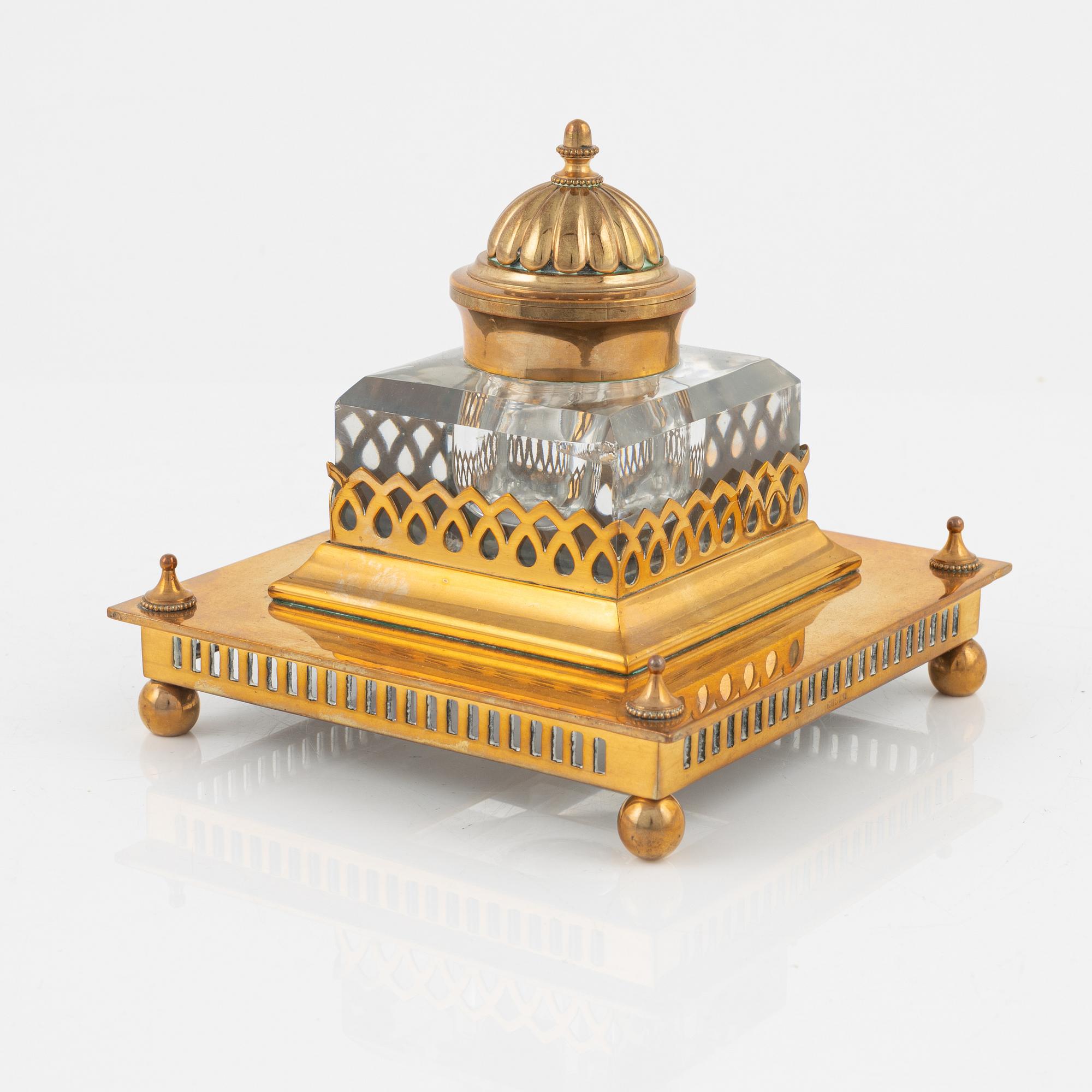 A four-piece brass writing set, Gusum, 20th century.