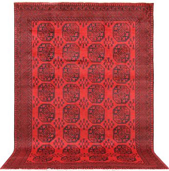 An Afghan carpet, c 296 x 203 cm.