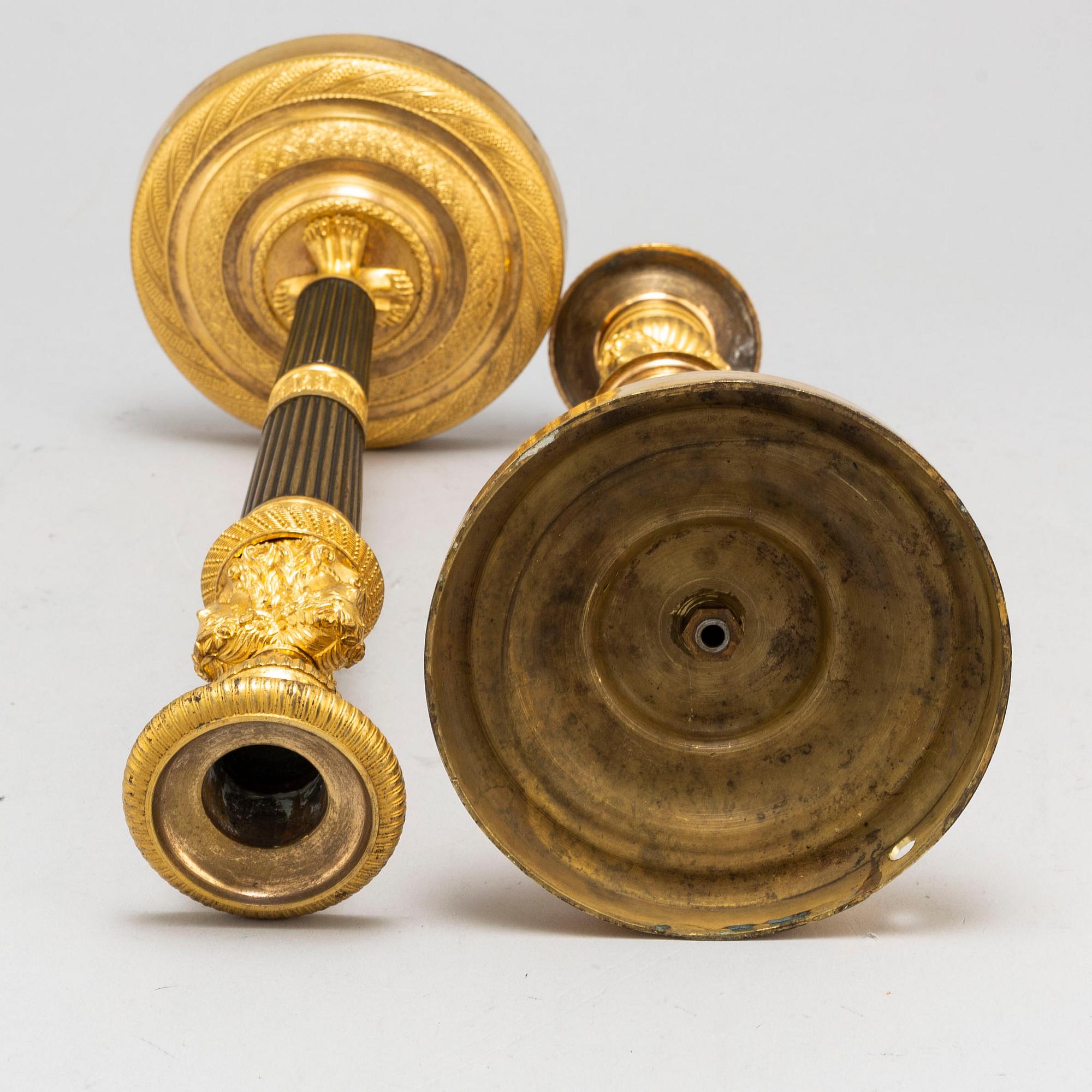 A pair of French Empire candlesticks, early 19th century.