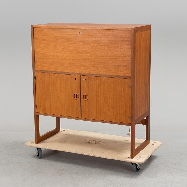 A second half of the 20th century teak veneered bar cabinet by Arne Wahl-Iversen, IKEA.