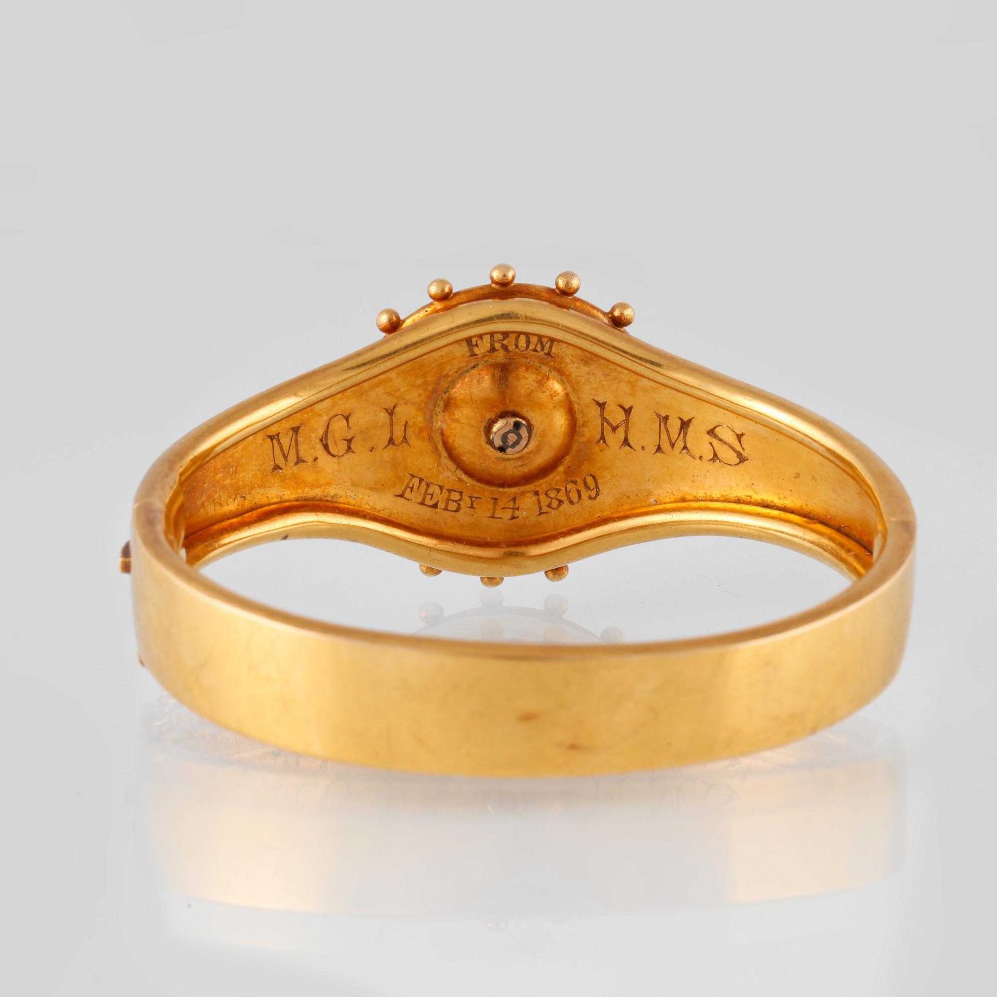 ARMBAND, 14K guld med turkoser och vit emalj. Vikt 28,8 gram.