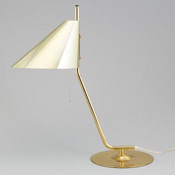 A brass table lamp by Hans Agne Jakobsson.