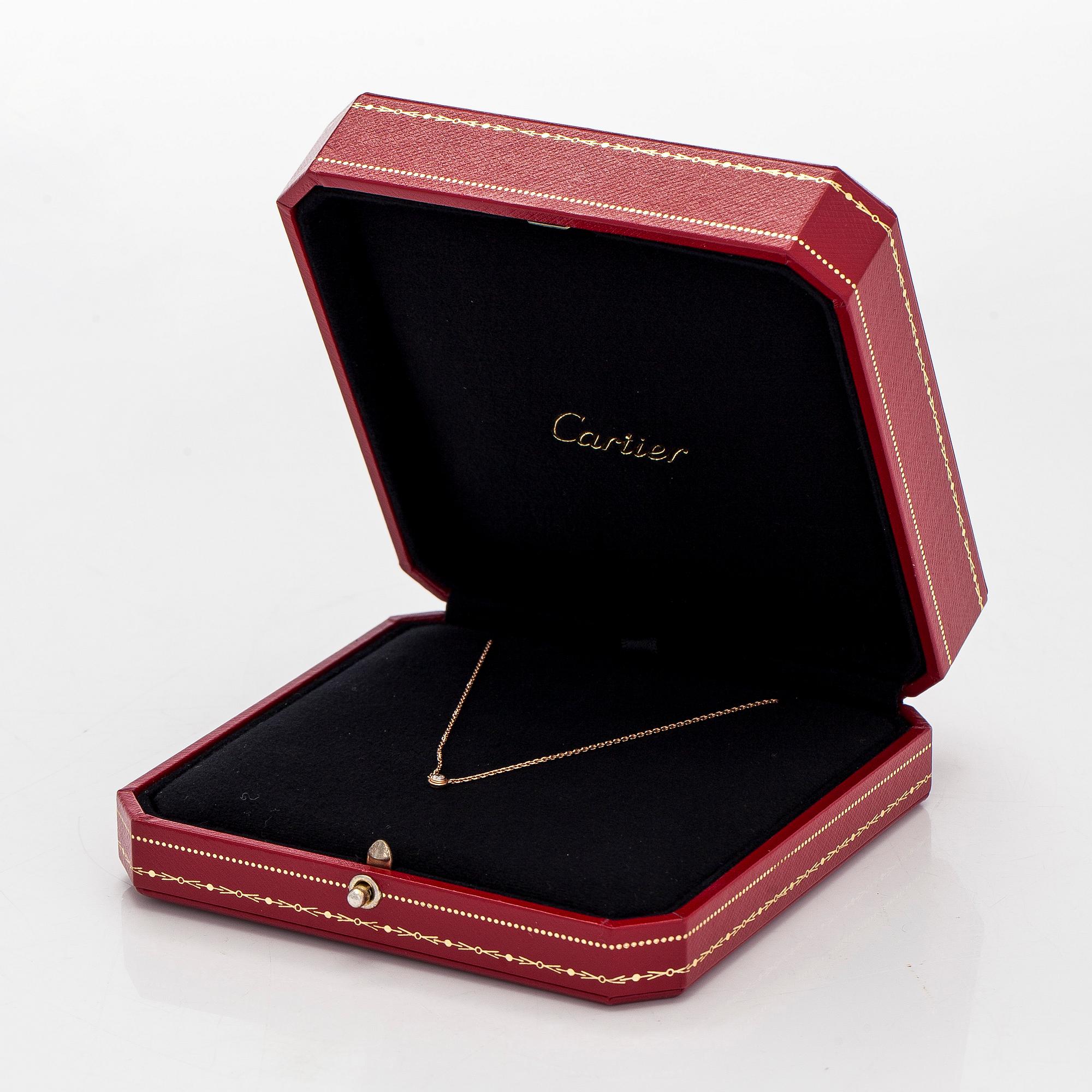 Cartier, an 18K gold 'd'Amour' necklace, with a brilliant-cut diamond.