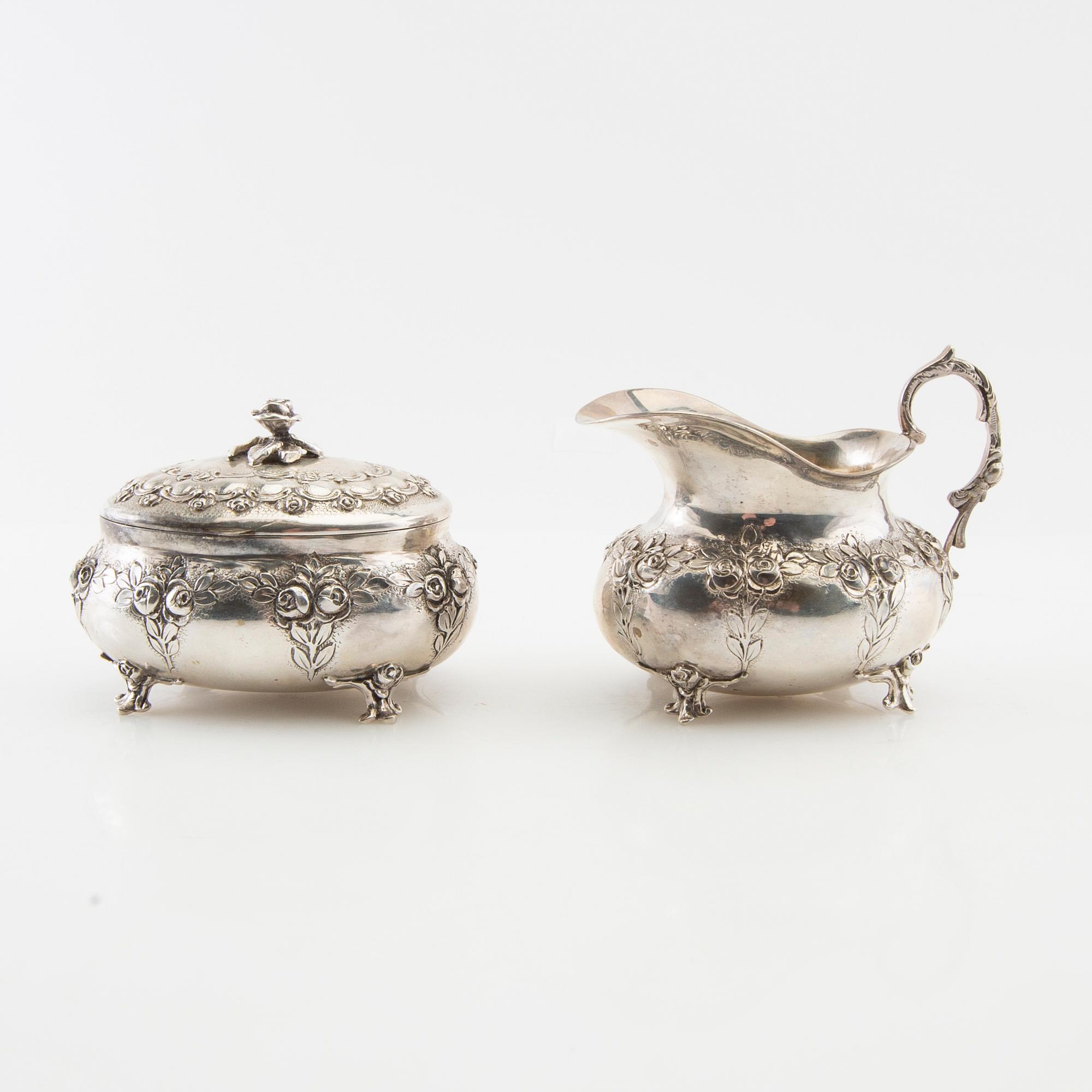 Sugar bowl, cream jug, tray and sugar tongs, 5 dlr silver, Swedish import marks, Rococo style.