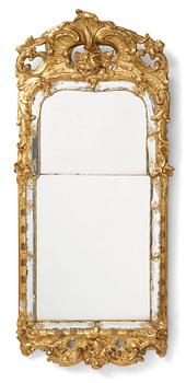 81. A giltwood rococo mirror, Stockholm, later part 18th century.