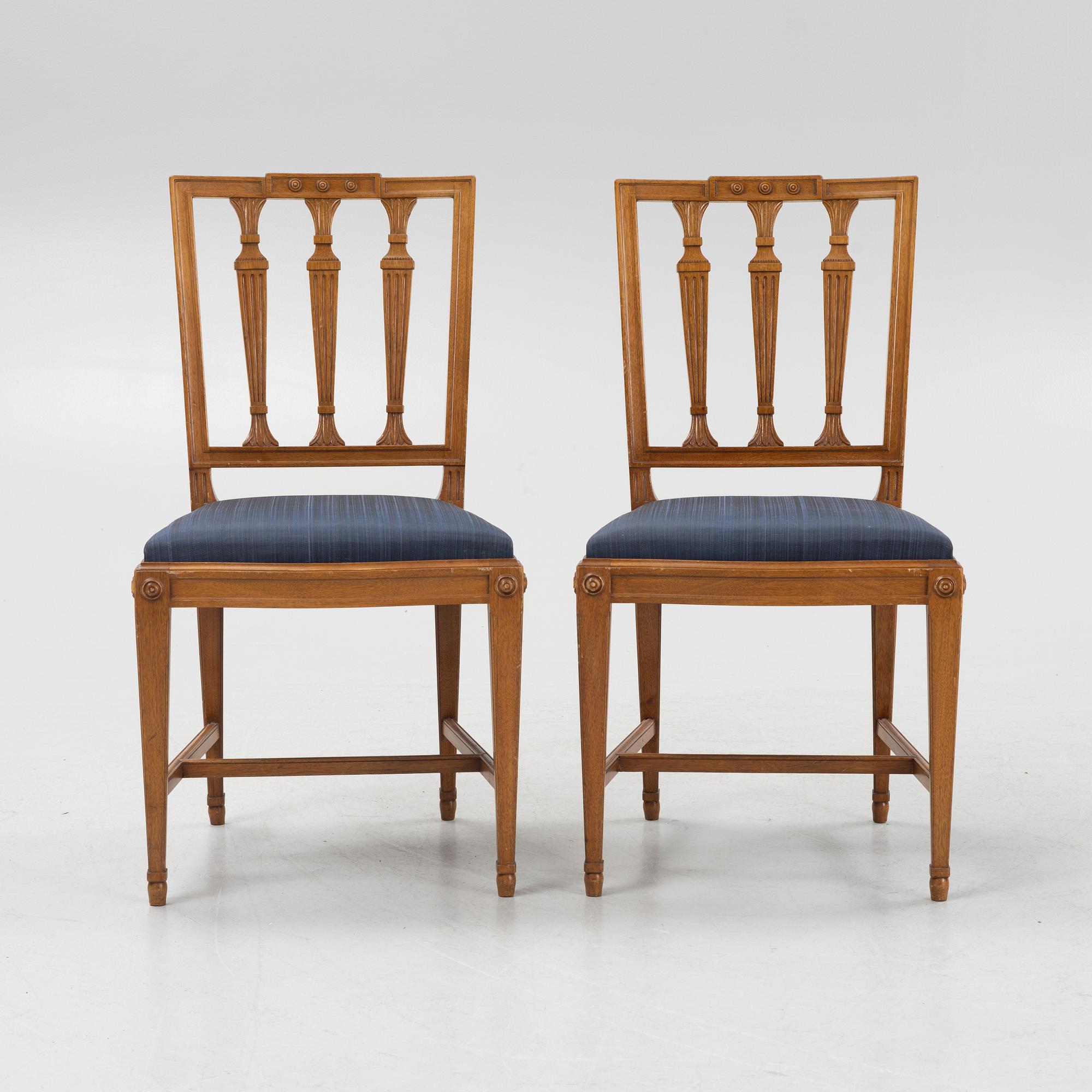 A Dining Table and Twelve Chairs, late Gustavian style, 20th Century.