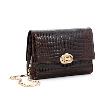 487. CÉLINE, a brown crocodile evening bag / shoulder bag with  shoulder strap.