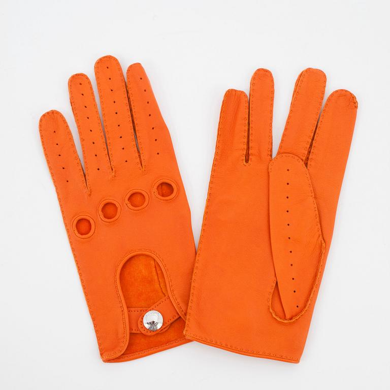 HERMÈS, a pair of orange lambskin leather gloves.