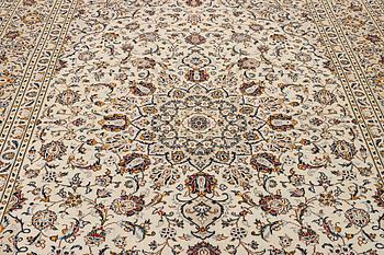 A Kashan carpet, c. 345 x 242 cm.