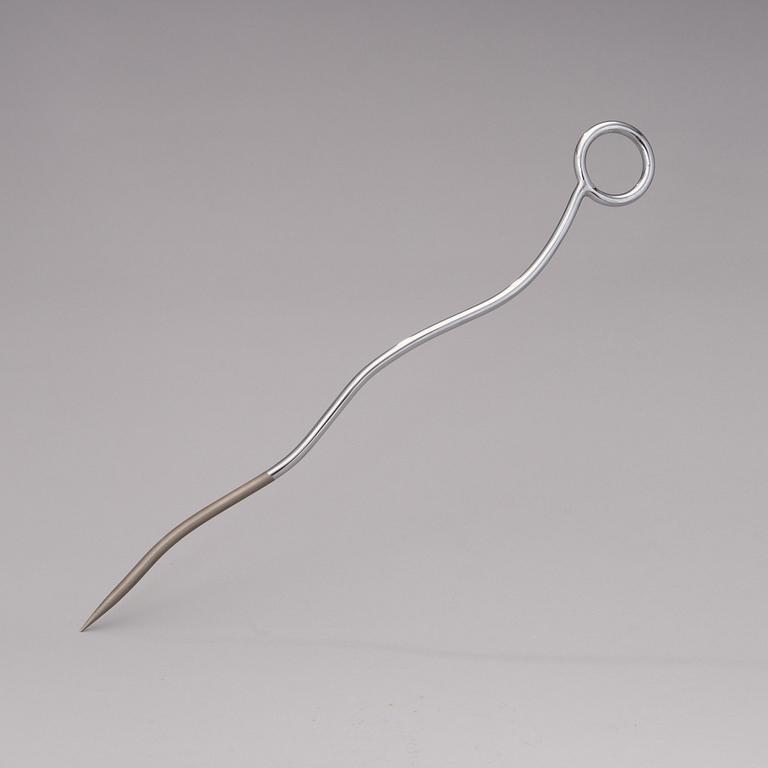 A pair of Chab Wellington coat hooks, a Smoki Christiani cork screw and a Picfeu fireplace poker. Late 1980s.