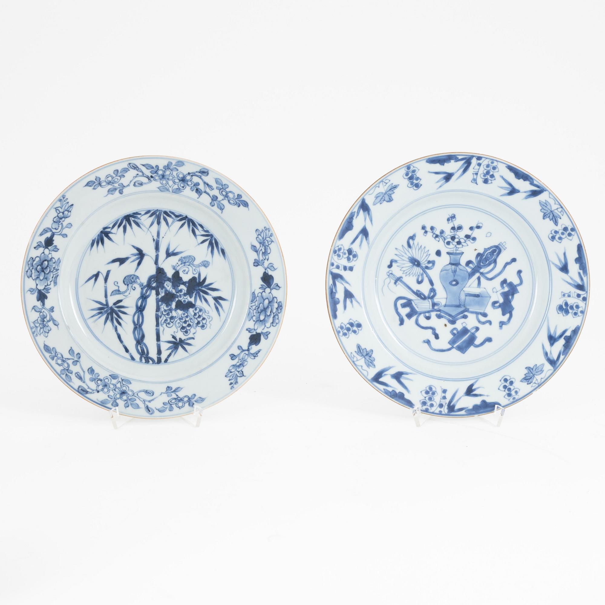 A group of Chinese blue and white porcelain: dish, vase, three cups and two plates. 18th and 20th century.