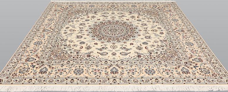 A Nain part silk carpet, c. 207 x 208 cm.