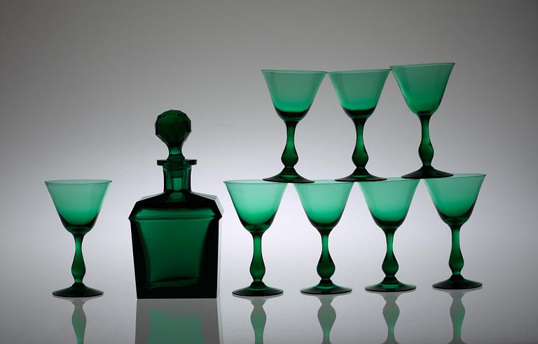 A set of eight glasses and a decanter, 20th Century.