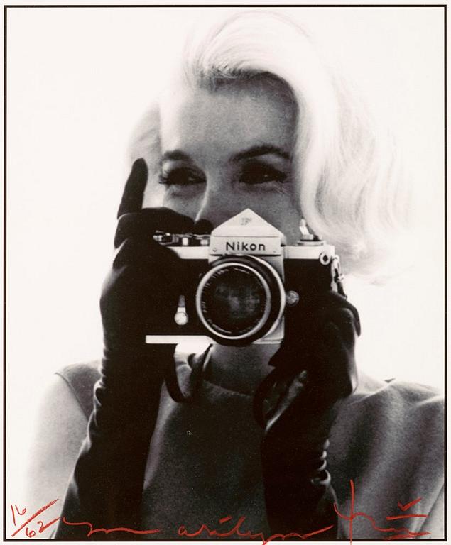 Bert Stern, "Marilyn Monroe with Nikon Camera".