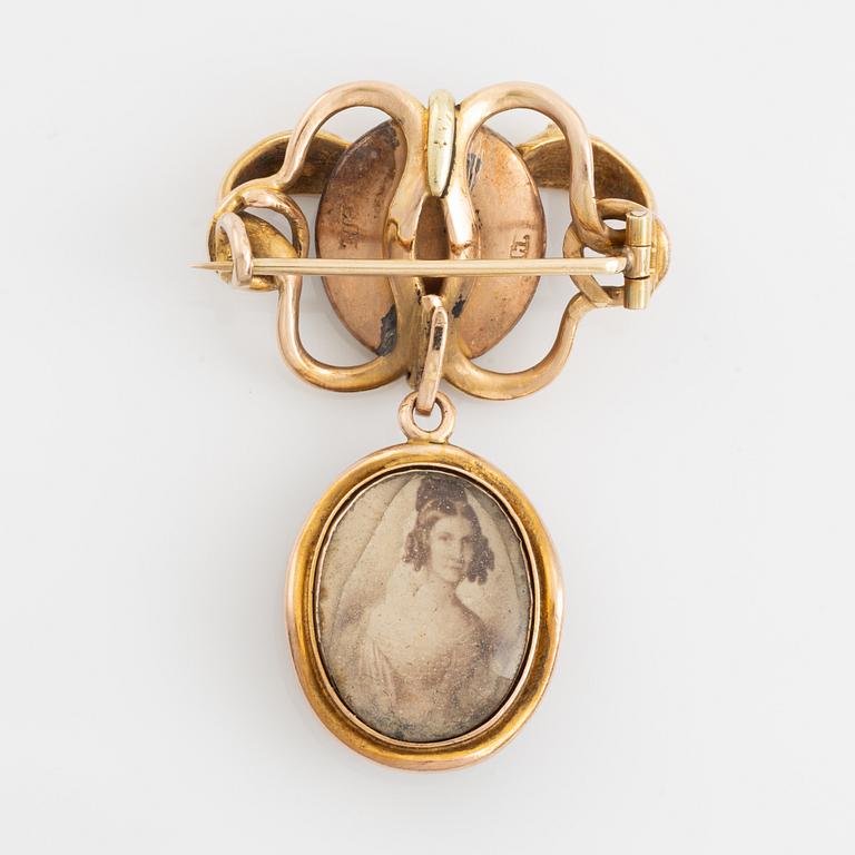 Brosch/medaljong 14K guld med granater, 1800-tal.
