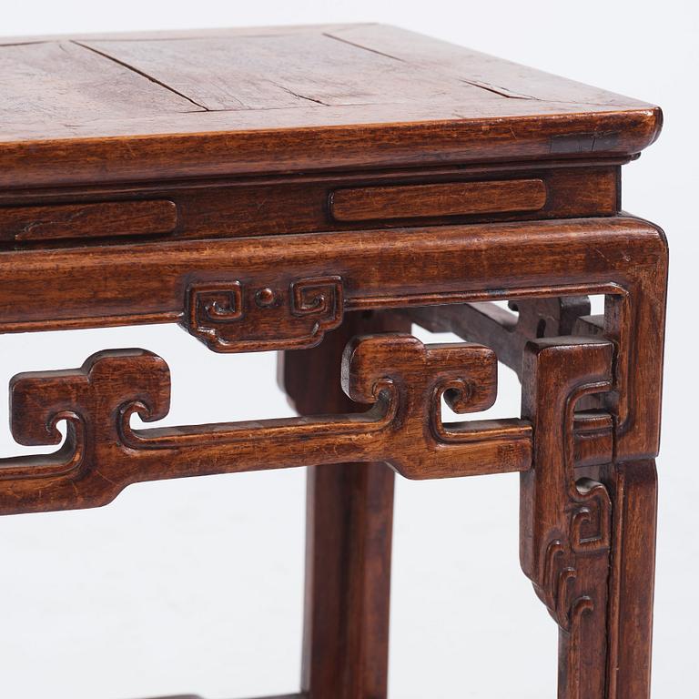 A Chinese hardwood table/seat, Qing dynasty, 19th Century.