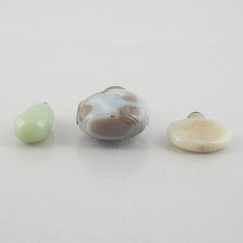 A group of three Chinese stone snuffbottles, 20th century.