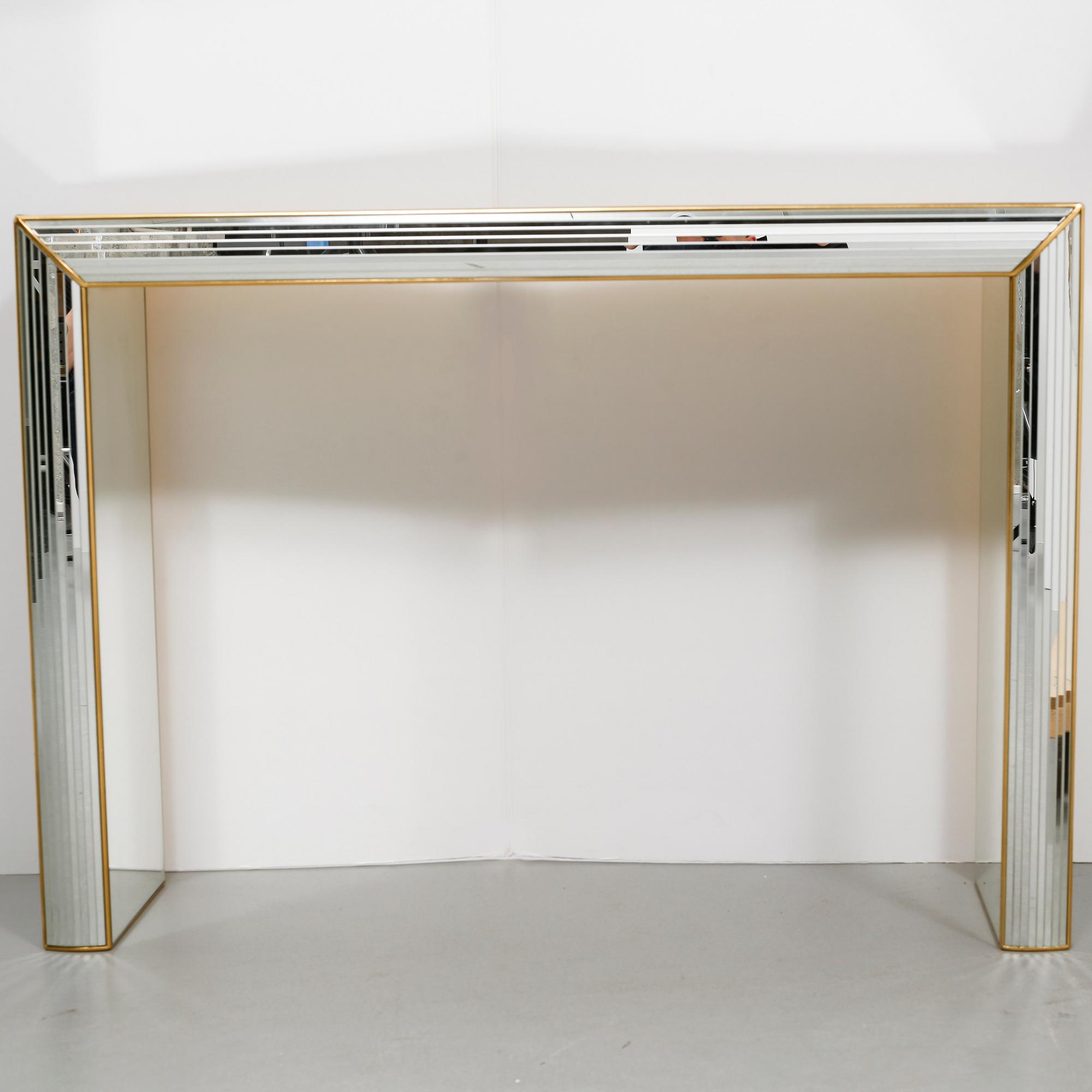 A late 20th century mirror and console table by Deknudt, Belgium.