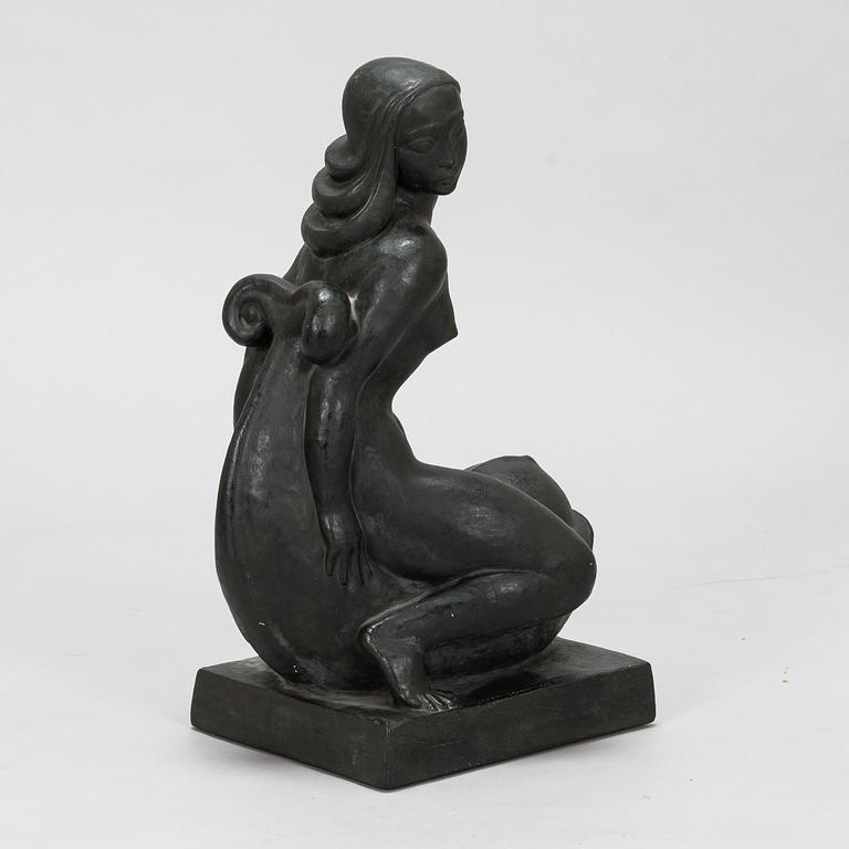 Ivar Johnsson, a painted plaster sculpture, signed.