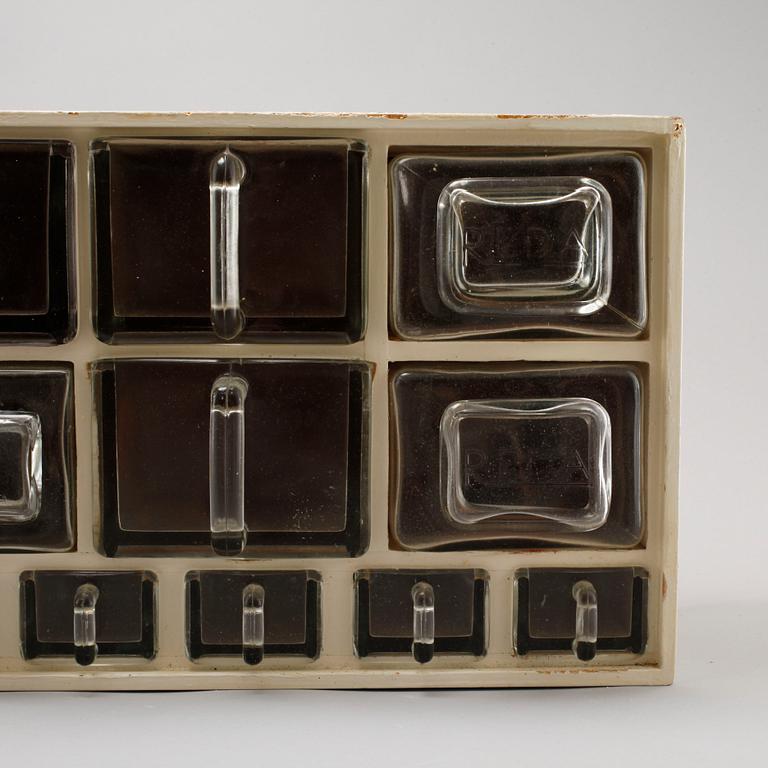 A mid 20th century spice rack.