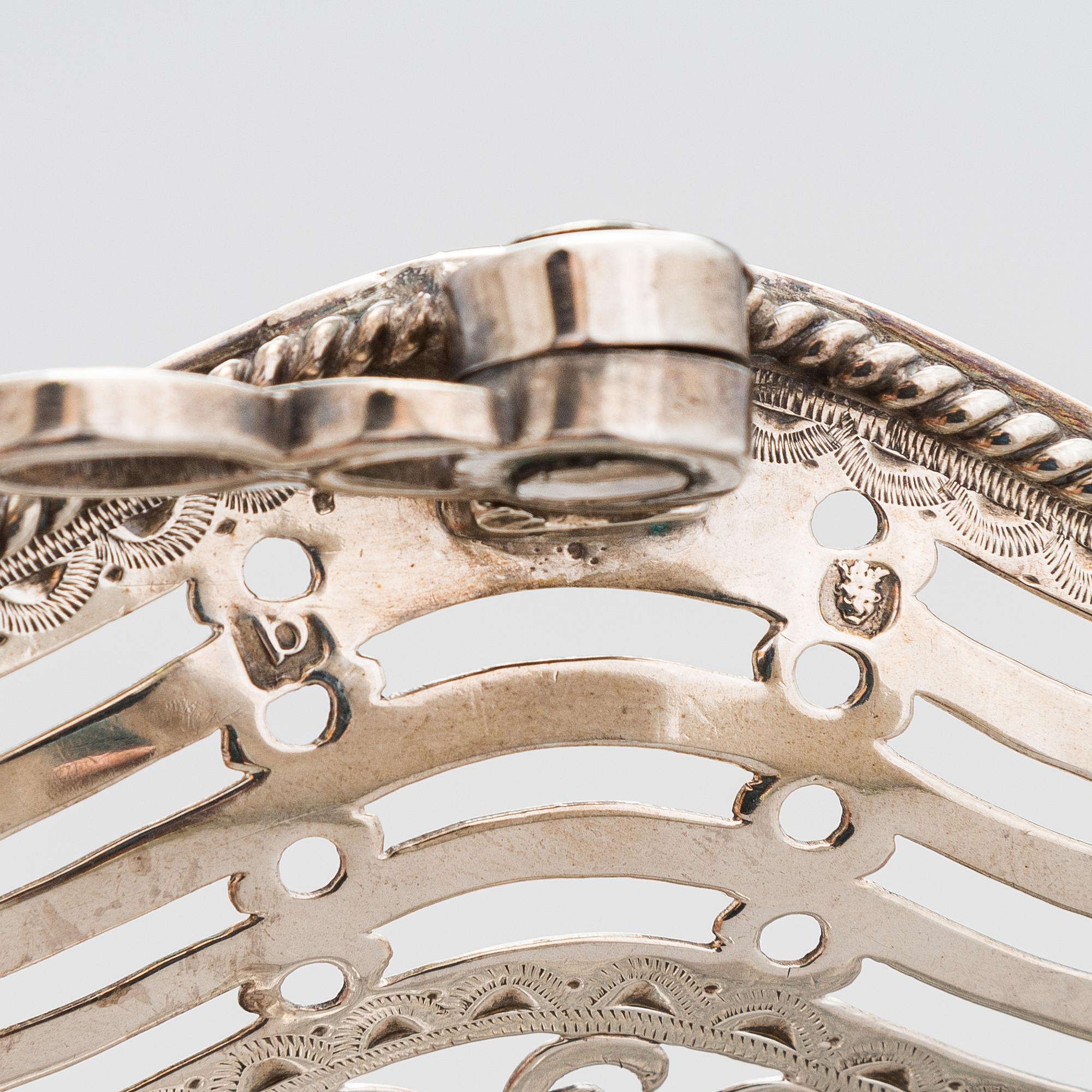 A George III sterling silver breadbasket, maker's mark of William Plummer, London 1777.